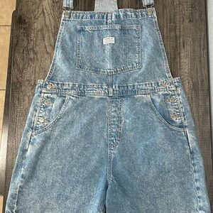 Levi's light blue denim overalls with patch label
